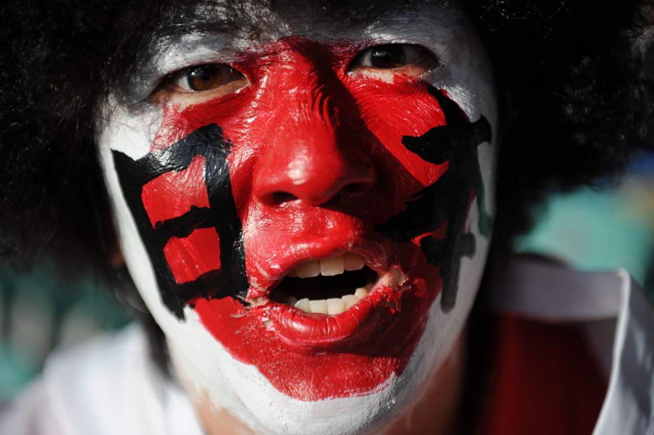 Fervor for rugby in Japan at all levels is on the rise -- here a fan supports the "Cherry Blossoms" during a 2011 Rugby World Cup match in New Zealand.