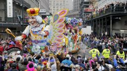 NEW OREANS, LA -  A float in the Rex parade turns on to Canal Street to large crowds with out outstretched arms on Mardi Gras Day. (Photo by Rusty Costanza/Getty Images)