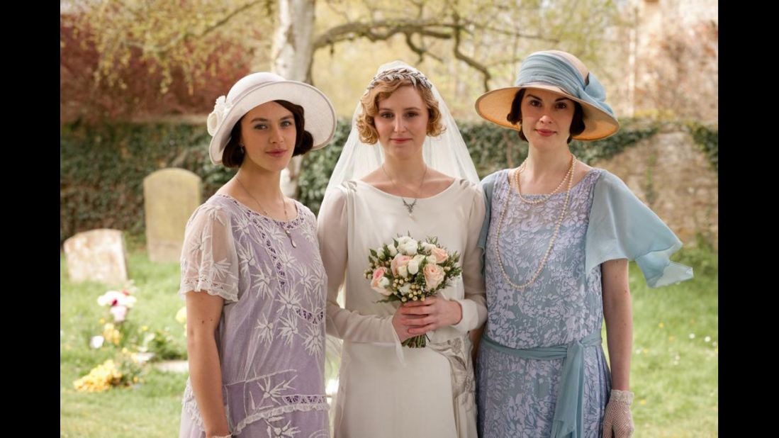 Lady Edith's wedding dress, center, was built around a vintage embroidered panel, with present-day embroidery added to the dress created around it, Eaton said. 