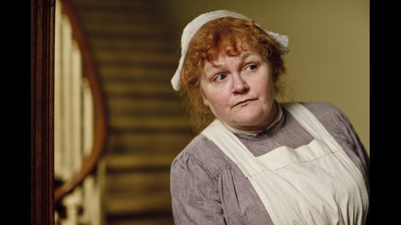 While women's fashions upstairs change quickly, servant's clothes like those worn by Mrs. Patmore remain much the same.