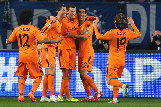 Real Madrid has also all but booked a place in the quarterfinals after a stunning 6-1 triumph at Schalke, with forwards Cristiano Ronaldo, Gareth Bale and Karim Benzema all scoring twice.