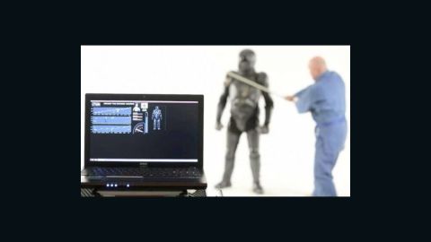 Pressure sensors spaced throughout the suit send messages to an external computer, telling it where, and how hard, a strike was. The results could be displayed to an audience or used to keep score.