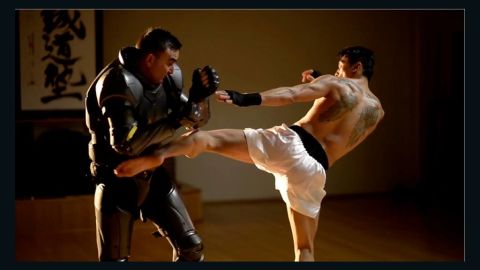 Sone Vannathy, right, a champion Muay Thai kickboxer, helped test the armor. It is designed to be lightweight and flexible, but still protect the wearer.