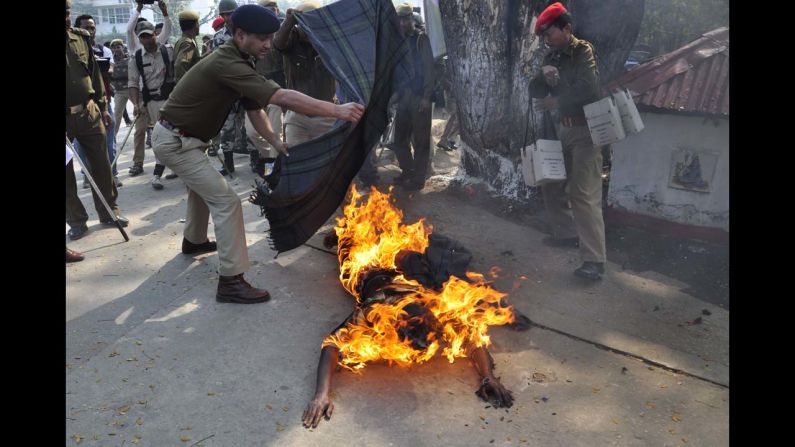 Activist Pranab Boro sets himself on fire Monday, February 24, during a protest demanding land rights for people in various regions of India's eastern Assam state. Police extinguished the flames, but Boro died after being hospitalized with burns covering more than 90% of his body.