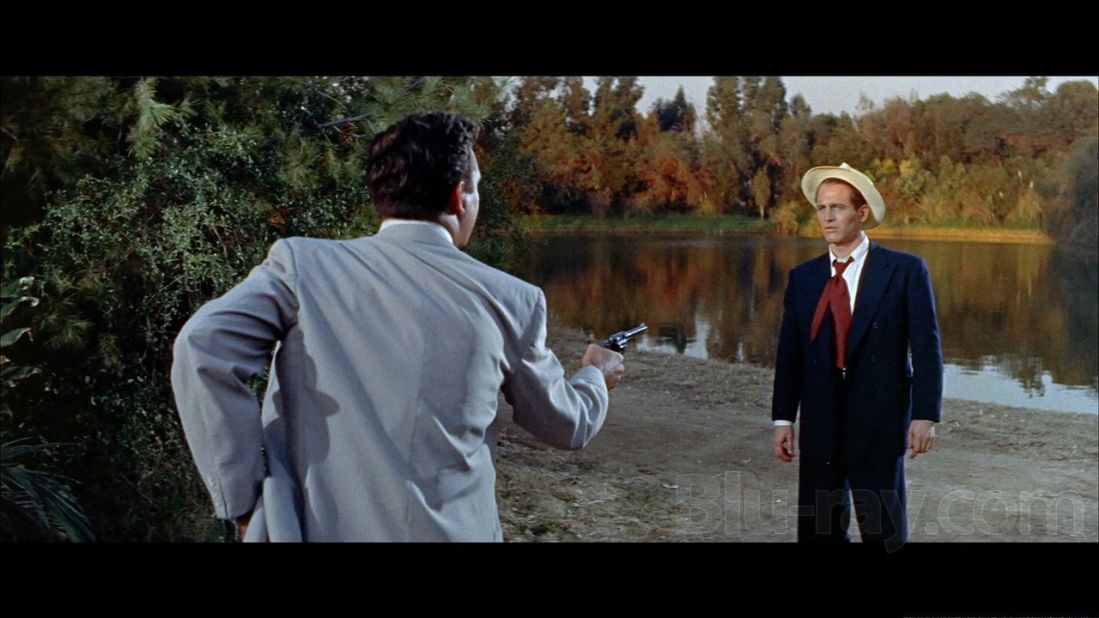 Anthony Franciosa pulls a gun on Paul Newman in the 1958 classic "The Long, Hot Summer."