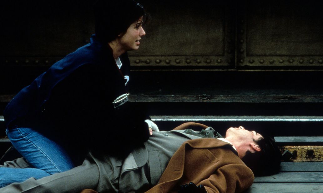 Sandra Bullock and Peter Gallagher star in 1995's "While You Were Sleeping." 