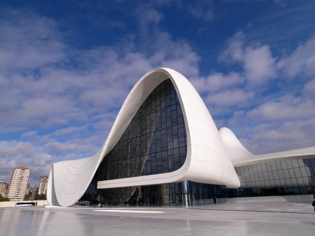 Renowned architect Zaha Hadid designed the center's fluid forms, which are a contrast to the rigid and monumental architecture in much of Baku. President Ilham Aliyev, who officially opened the building in May 2012, named the building after his late father and former president Heydar Aliyev.