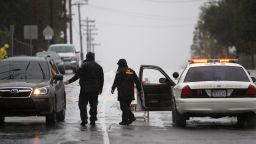 GLENDORA, CA - FEBRUARY 28:  A roadblock keeps people from entering an evacuated neighborhood below the Colby Fire burn area as a storm brings rain in the midst of record drought on February 28, 2014 in Glendora, California. The rain offers some relief to the dry conditions but is not expected to be enough to break the historic drought. A drought-related unseasonal wildfire, the Colby Fire, was accidentally ignited in the dry chaparral vegetation in January, destroying homes and sending thousands fleeing. The charred and denuded hillsides are threatening the homes of about a thousand evacuated residents with rain-loosened mud-ash debris flows.   (Photo by David McNew/Getty Images)