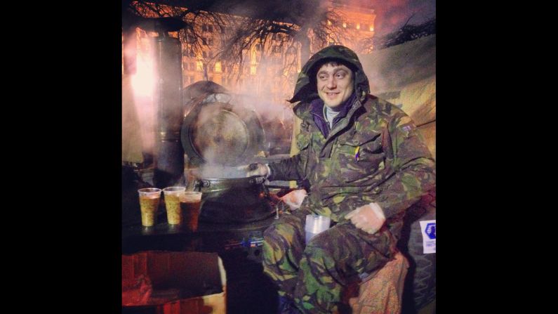 KIEV, UKRAINE:  "27-year old Bogdan sits on top of his Russian-made soup kitchen in Indepence -- or Maidan -- Square on March 2. He's been sitting there for the last three months serving delicious Ukrainian grechaniy soup. It's made of buckwheat, lentil, coriander and beef. Amazing taste." - CNN's Christian Streib.  Follow Christian on Instagram at <a href="https://trans.hiragana.jp/ruby/http://instagram.com/christianstreibcnn" target="_blank" target="_blank">instagram.com/christianstreibcnn</a>.