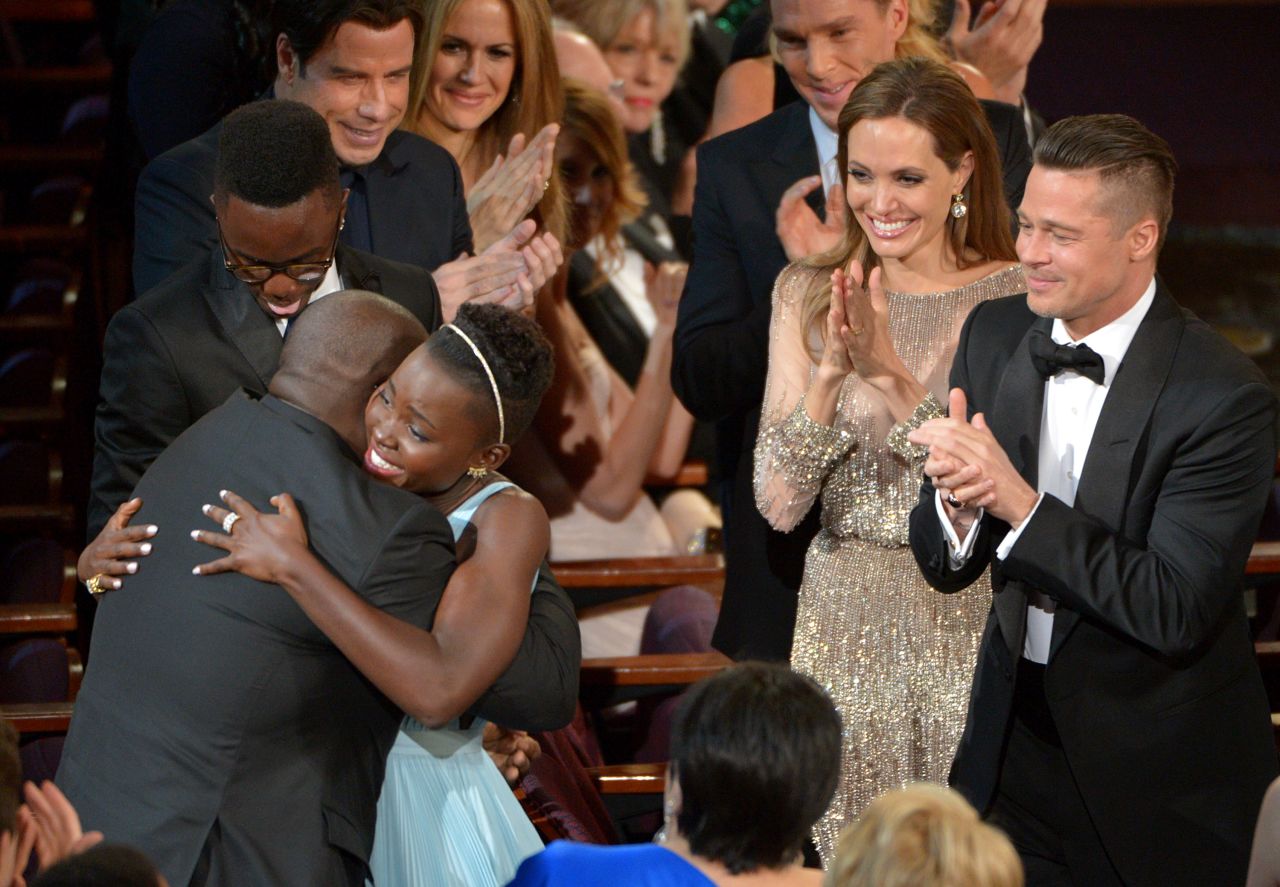 Lupita Nyong'o hugs McQueen after winning best supporting actress for her role in "12 Years a Slave."