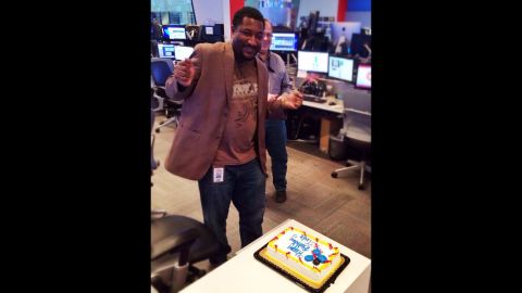Mungin celebrates his 41st birthday in the CNN newsroom after returning to work from brain surgery.