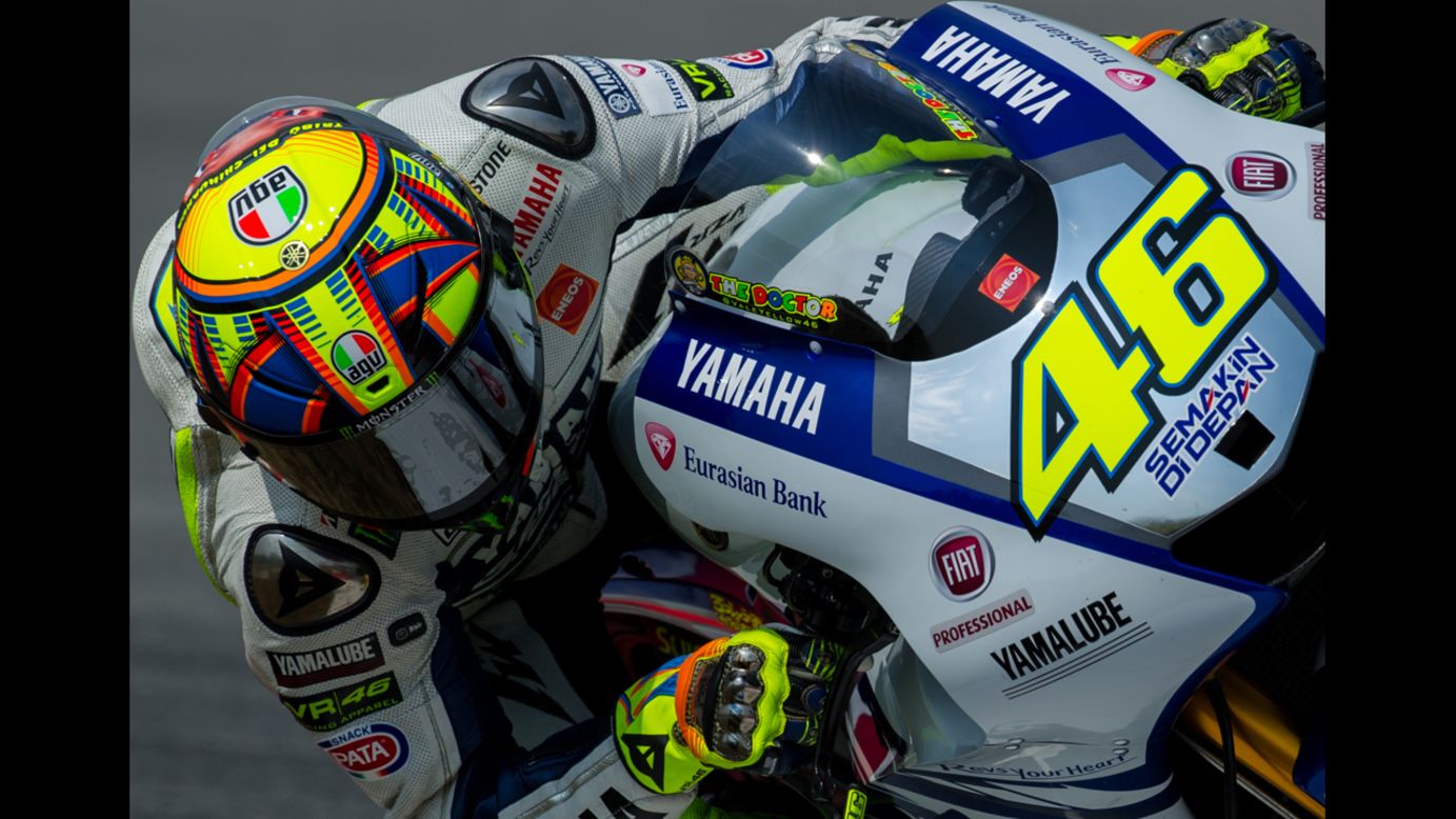 Motorcycle racer Valentino Rossi steers his bike during a MotoGP preseason test in Kuala Lumpur, Malaysia, on Thursday, February 27.