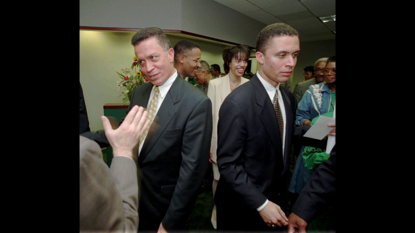 Then-Rep. Harold Ford, D-Tennessee, left, and his son, Harold Jr. shake hands with supporters in this 1996 photo. Harold Ford Sr. announced earlier that year that he was retiring from the seat he had held for 22 years and Harold Ford Jr. won the seat that fall.