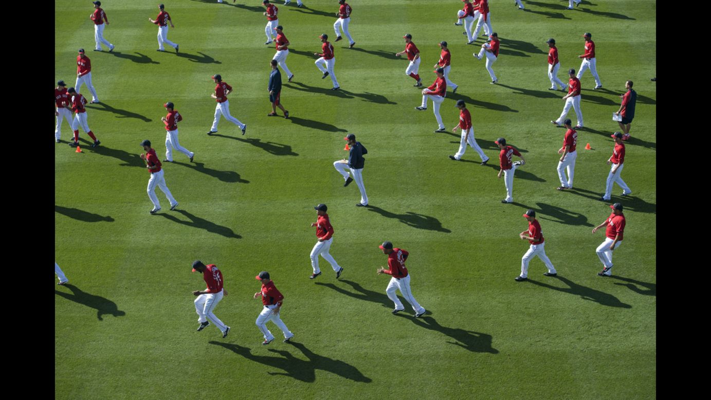 The Boston Red Sox warm up before a Grapefruit League game against the Minnesota Twins on Friday, February 28, in Fort Myers, Florida.