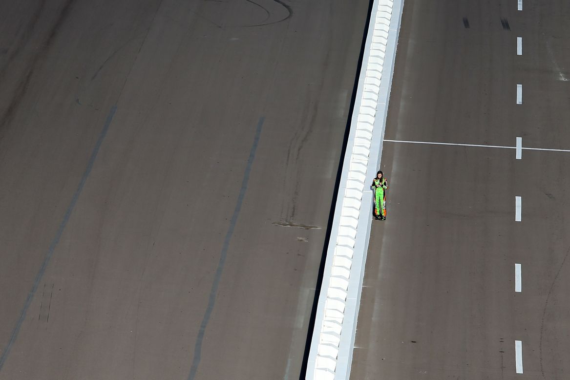 Race car driver Danica Patrick stands on pit road Friday, February 28, before NASCAR Sprint Cup qualifying at Phoenix International Raceway.