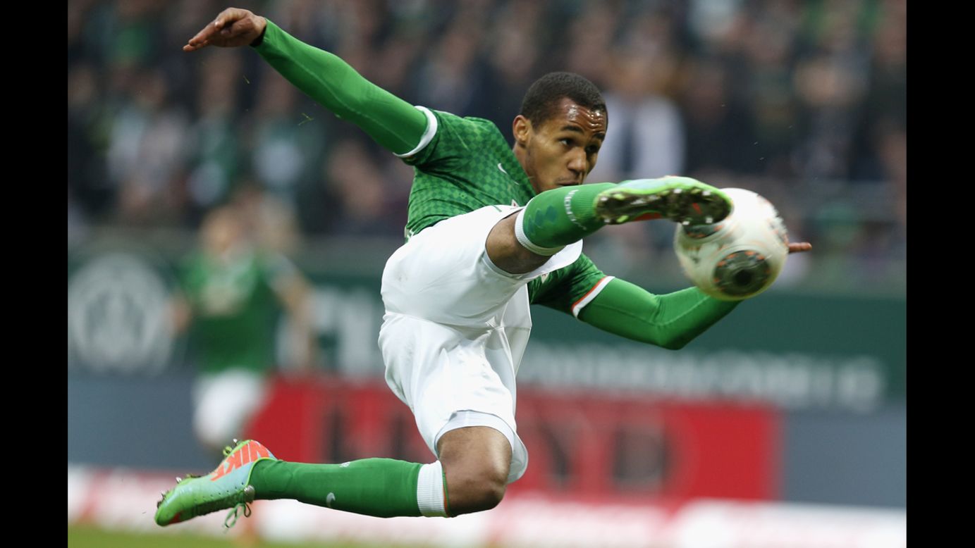 Theodor Gebre Selassie leaps to kick the ball during a Bundesliga match between Werder Bremen and Hamburger SV on Saturday, March 1, in Bremen, Germany. 