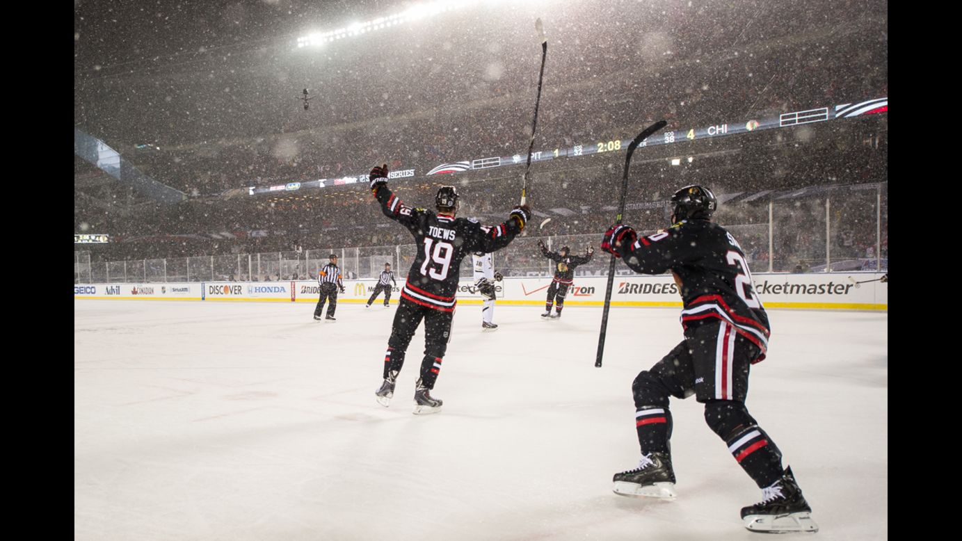 Jonathan Toews of the Chicago Blackhawks reacts after scoring his second goal of the night against the Pittsburgh Penguins on Saturday, March 1. The game was held outdoors at snowy Soldier Field in Chicago.