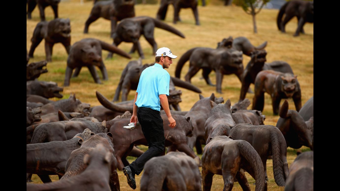 David Klein walks on the 18th hole of The Hills Golf Club during the final round of the New Zealand Open on Sunday, March 2. The course, in Queenstown, New Zealand, is adorned with sculptures of a sword-wielding warrior and 110 wolves.