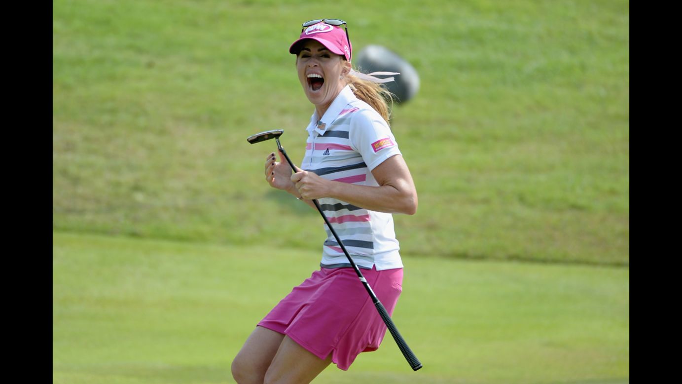 Paula Creamer celebrates after holing a 75-foot eagle putt to win the HSBC Women's Champions event in Singapore on Sunday, March 2.