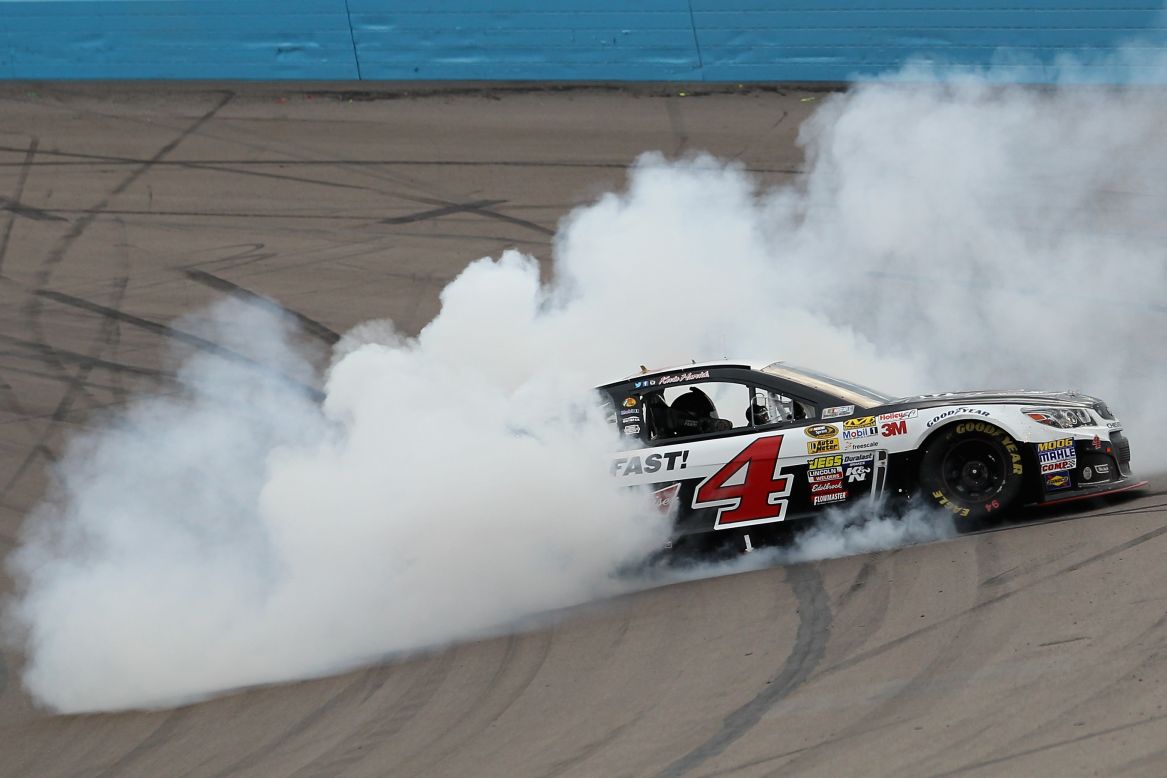 Kevin Harvick celebrates with a burnout after winning the NASCAR Sprint Cup race at Phoenix International Raceway on Sunday, March 2.