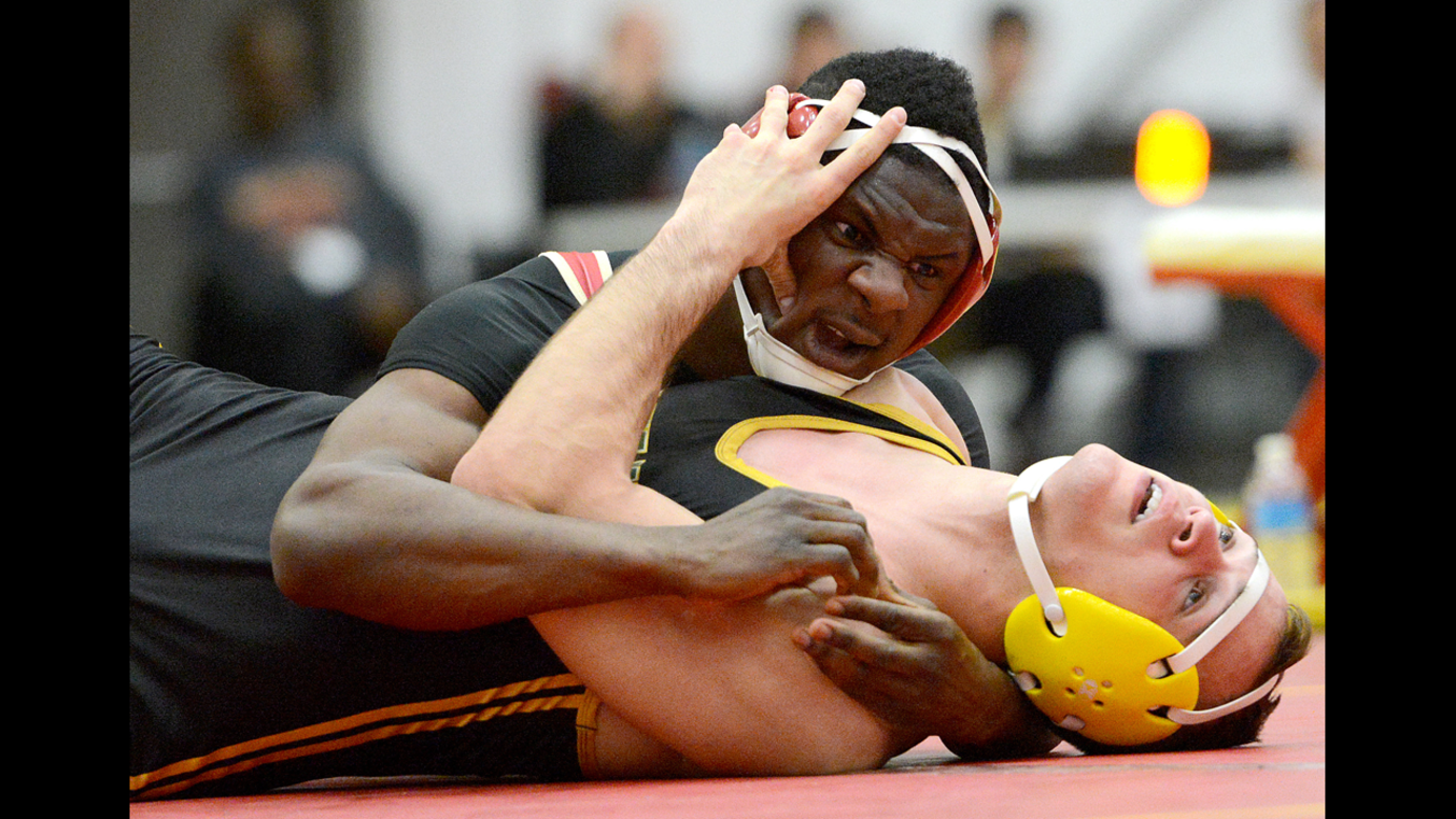 King's College's Tommy Desir turns over Delaware Valley's Alec Horan during the NCAA Division III East Regional wrestling championships in Wilkes-Barre, Pennsylvania, on Sunday, March 2.