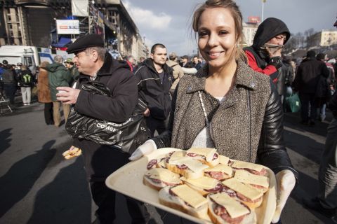During the demonstrations and afterward, people passed out sandwiches for protesters who were camped out in the city square.