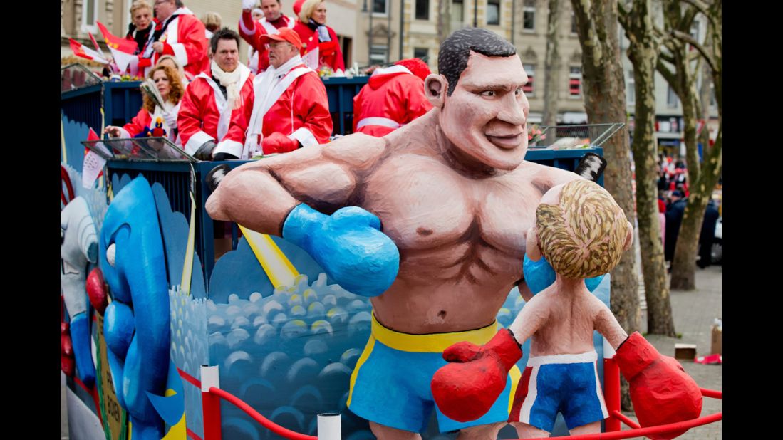 At a parade in Cologne, Germany, figures depict Vitali Klitschko, the Ukrainian opposition leader and former heavyweight boxing champion, fighting Russian President Vladimir Putin on March 3.