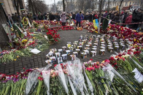 "People are still coming with <a href="http://ireport.cnn.com/docs/DOC-1098749">flowers</a> and grieving for the heroes who laid their lives for free Ukraine. The streets are like rivers of flowers,'" Mikhaluk said.