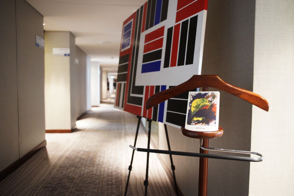 The Asia Hotel Art Fair 2014 used the Marco Polo Hongkong Hotel last weekend to exhibit artworks. Prices on pieces displayed ranged from $200 to $1 million. A Diamante Galasso painting and Nerone postcards from Gallery Koo greeted customers in this corridor.