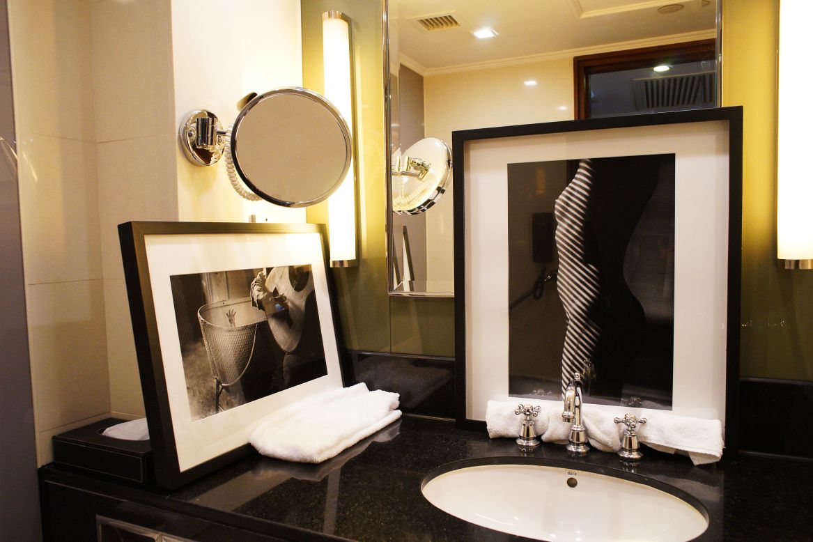 The hotel's seventh and eighth floors were used for displays. Ralph Gibson's black-and-white photographs were hung on walls, placed on a bed and propped against mirrors and bathtubs.