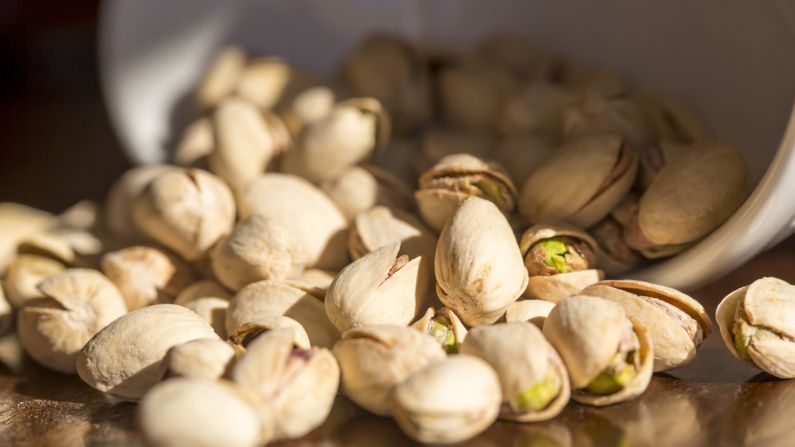 Here's another way to slow down your eating: munch on foods that require shelling, peeling or individual unwrapping, suggests Blatner. Oranges, edamame and pistachios in their shells are healthy options. <br /><br /><a href="index.php?page=&url=http%3A%2F%2Fwww.health.com%2Fhealth%2Fgallery%2F0%2C%2C20516496%2C00.html" target="_blank" target="_blank">Health.com: How to lose 12 pounds in a month </a><br />