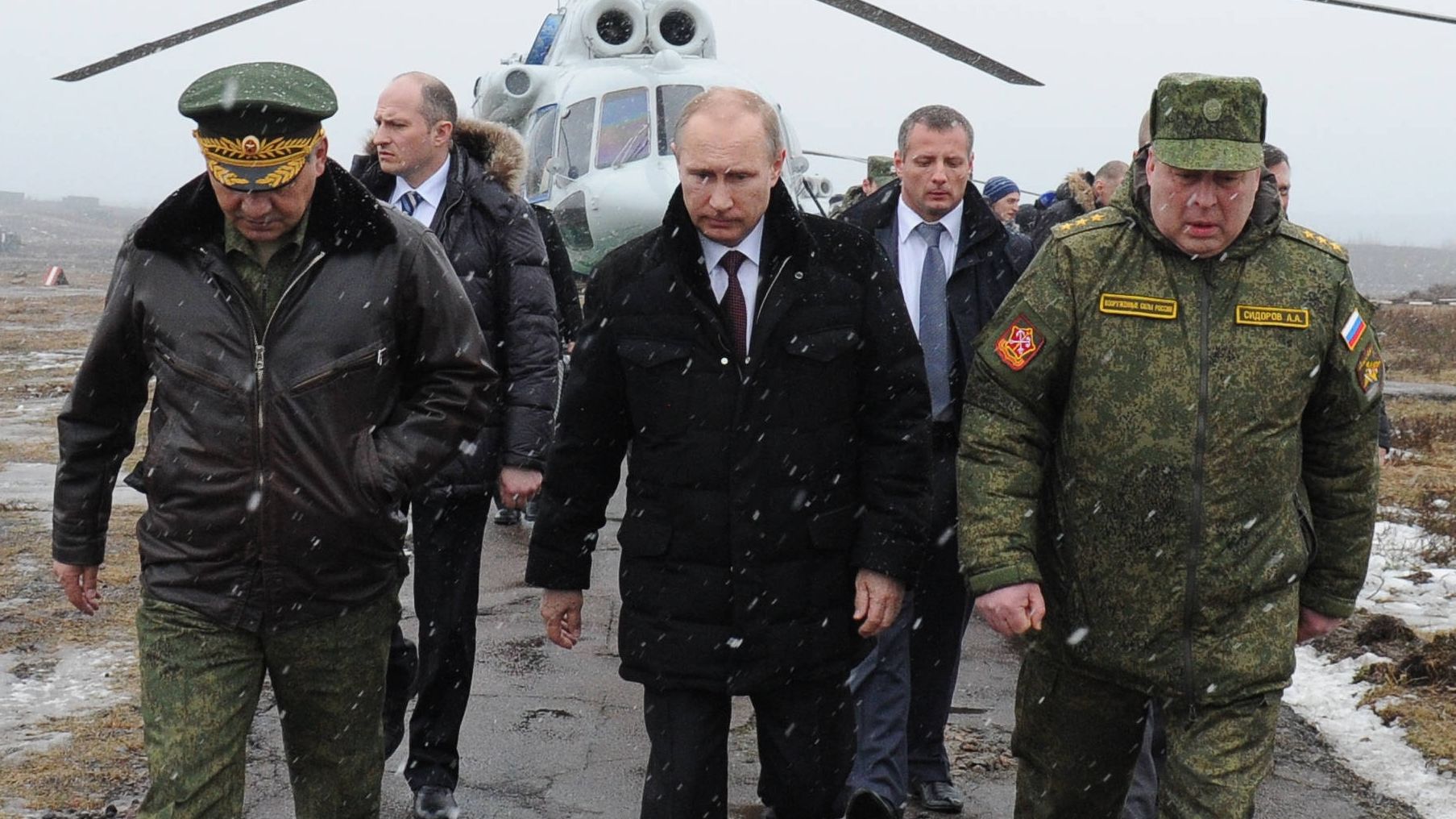 Russian President Vladimir Putin arrives to watch a military exercise near St.Petersburg, Russia, Monday
