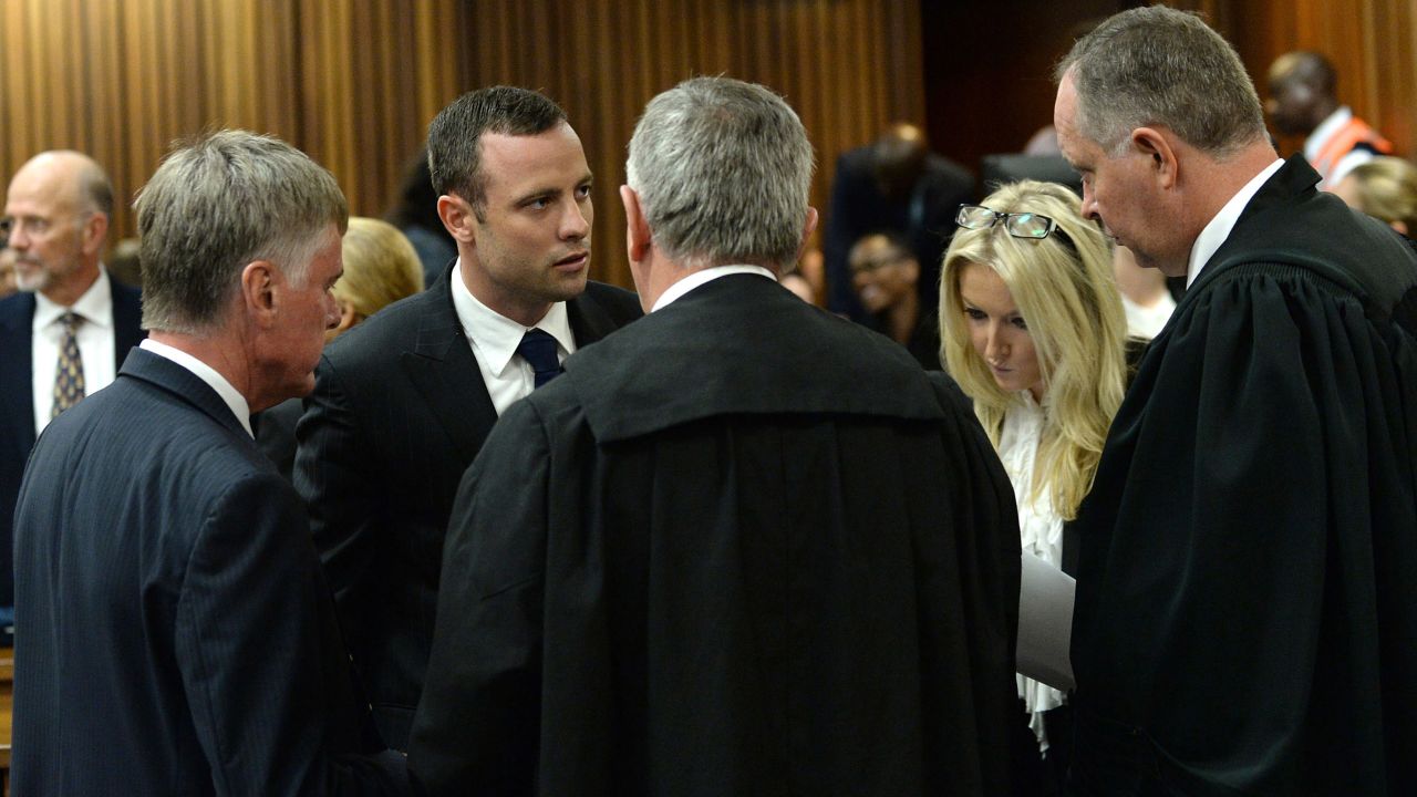 Pistorius speaks with his legal representatives on March 4.