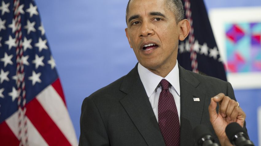 US President Barack Obama comments on the situation in Ukraine following a tour of a classroom at Powell Elementary School for an event on the Fiscal Year 2015 budget in Washington, DC, March 4, 2014. Obama said Tuesday that President Vladimir Putin's rationale for his incursion into Crimea was not "fooling anybody" and said Russian "meddling" would push states away from Moscow.AFP PHOTO / Saul LOEB        (Photo credit should read SAUL LOEB/AFP/Getty Images)