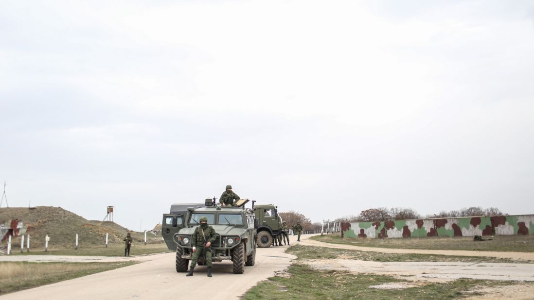Russian soldiers stand guard at the Belbek air base on March 4.