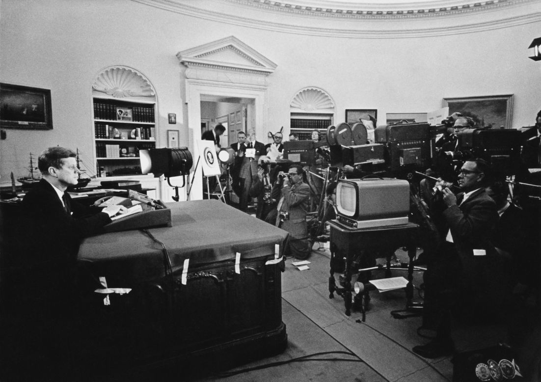 U.S. President John F. Kennedy delivers a nationally televised address about the Cuban missile crisis on October 22, 1962. After learning that the Soviet Union had begun shipping missiles to Cuba, Kennedy announced a strategic blockade of Cuba and warned the Soviet Union that the U.S. would seize any more deliveries.