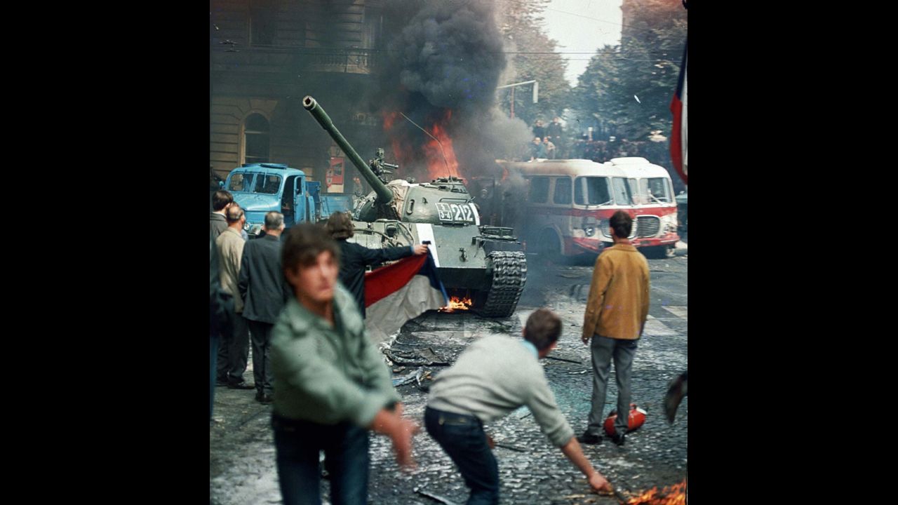 Residents of Prague, Czechoslovakia, throw burning torches in an attempt to stop a Soviet tank on August 21, 1968.  A Soviet-led invasion by Warsaw Pact troops crushed the so-called Prague Spring reform and re-established totalitarian rule.