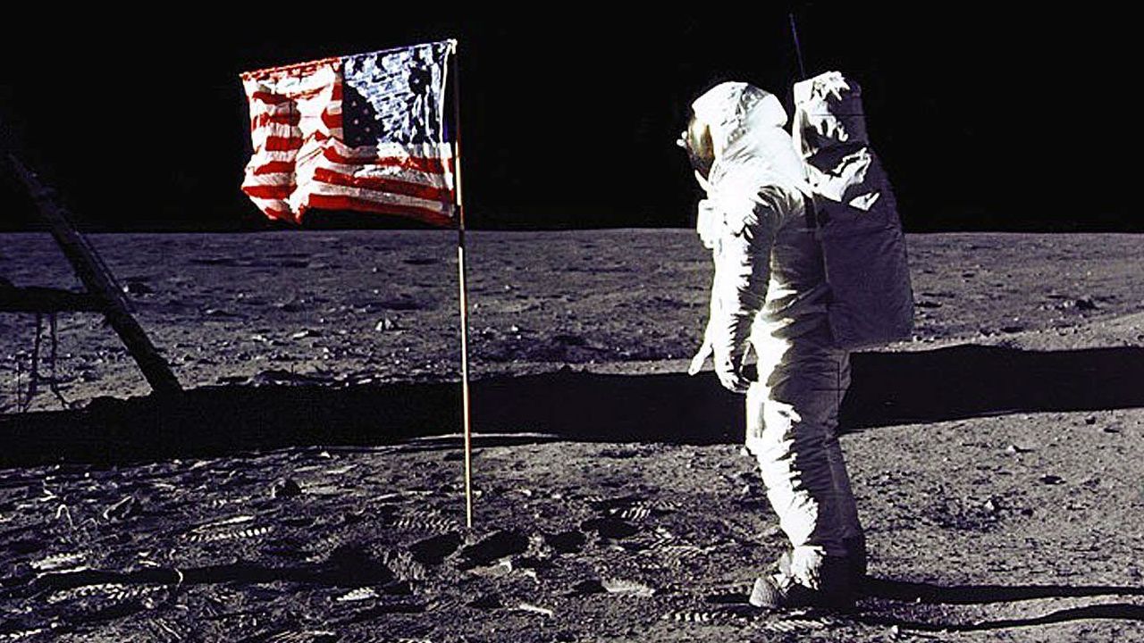 Edwin "Buzz" Aldrin, who was with Armstrong on Apollo 11, salutes the US flag on the lunar surface. Aldrin followed Armstrong and became the second man to walk on the moon.