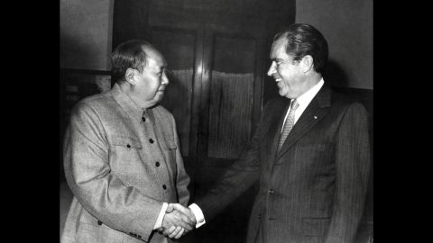 Chinese leader Mao Zedong shakes hands with U.S. President Richard Nixon after their meeting in Beijing on February 22, 1972. Nixon became the first U.S. president to visit China. The two countries issued a communiqué recognizing their "essential differences" while making it clear that "normalization of relations" was in all nations' best interests. The rapprochement changed the balance of power with the Soviets. Two-and-a-half years later, Nixon resigned as president amid the Watergate scandal.