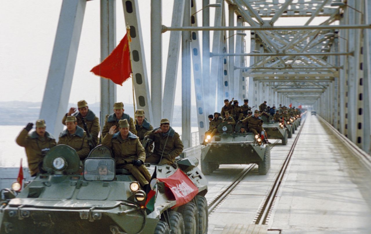 Soviet troops cross the Soviet-Afghan border along the bridge over the Amu Darya river near the town of Termez, Uzbekistan, during their withdrawal from Afghanistan on February 6, 1989. The Soviet Union invaded Afghanistan in 1979 as communist Babrak Karmal seized control of the government. U.S.-backed Muslim guerrilla fighters waged a costly war against the Soviets for nearly a decade.