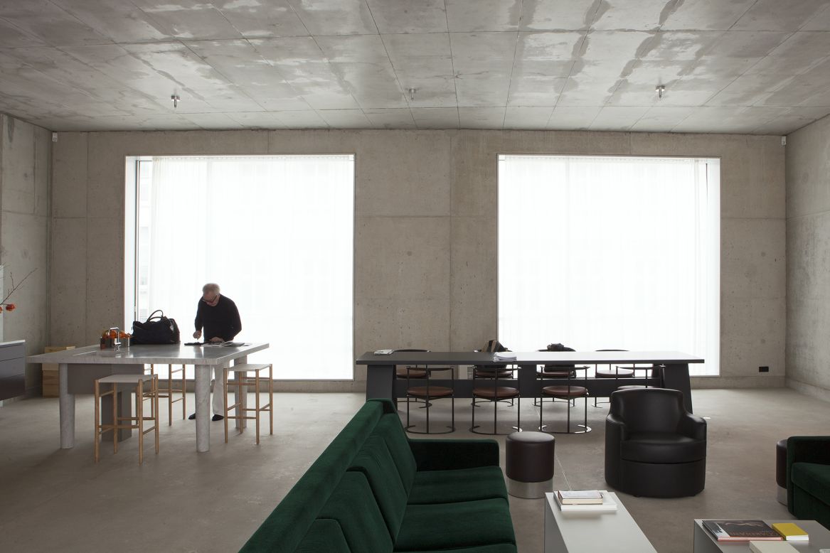 <em>David Chipperfield, Berlin </em><br /><br />Molteni says the house is not as cold as you might think, and much of the warmth extends from Chipperfield himself. "He was walking around with no shoes and was very comfortable having the crew around," she says. "The more they are living in the house, the more the concrete will disappear. It's just a frame for the people and objects."