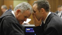 Pistorius talks with his attorney, Barry Roux inside the court on March 4.