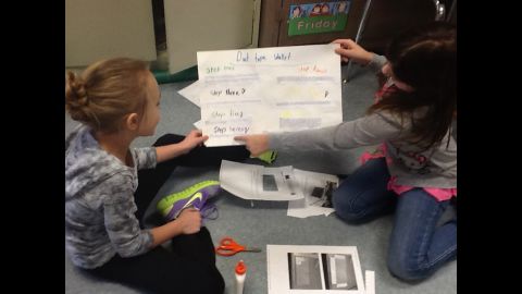 Warner Elementary School third-graders Emma Reed, left, and Jamison Barnes chose to create wallets out of duct tape for their genius hour project. Upon completion, students shared their projects in a classroom presentation.