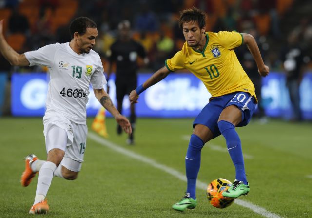 Neymar scored a hat-trick as Brazil cruised to a 5-0 win against South Africa. The Barcelona star was in impressive form while further goals from Chelsea's Oscar and Manchester City's Fernandinho wrapped up the win.<br /><br />