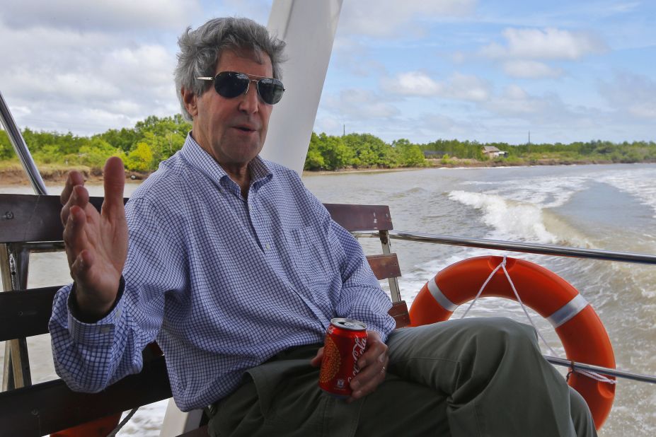 Kerry talks to reporters on a boat on the Mekong River Delta in Vietnam in December. Kerry had patrolled the muddy waters 40 years earlier as a U.S. naval officer. Kerry also visited Ho Chi Minh City and Hanoi. 