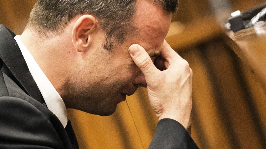 Oscar Pistorius cries while a witness gives graphic testimony of the night his girlfriend Reeva Steenkamp was killed .