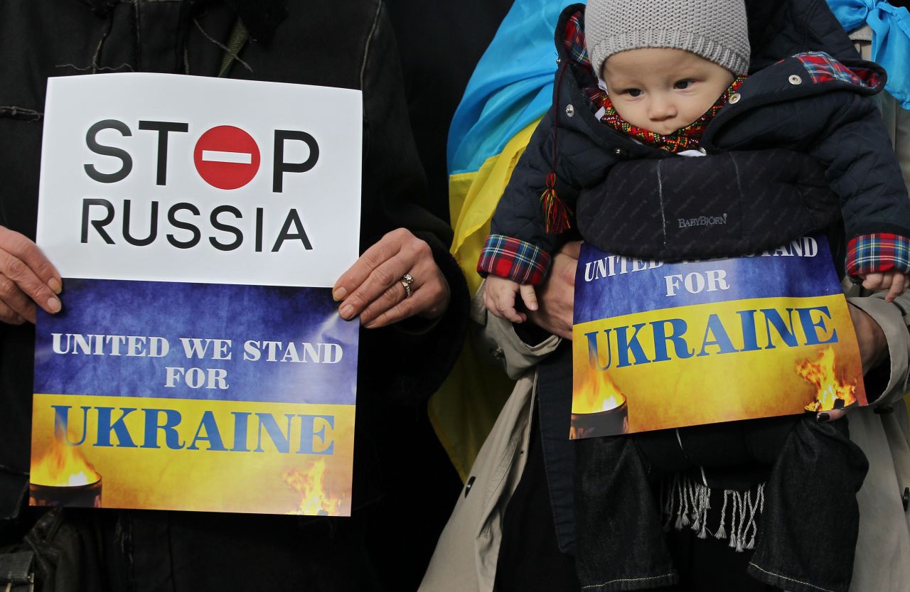 Pro-Ukrainian supporters demonstrate in Dublin where delegates have been arriving for the European Peoples Party conference.