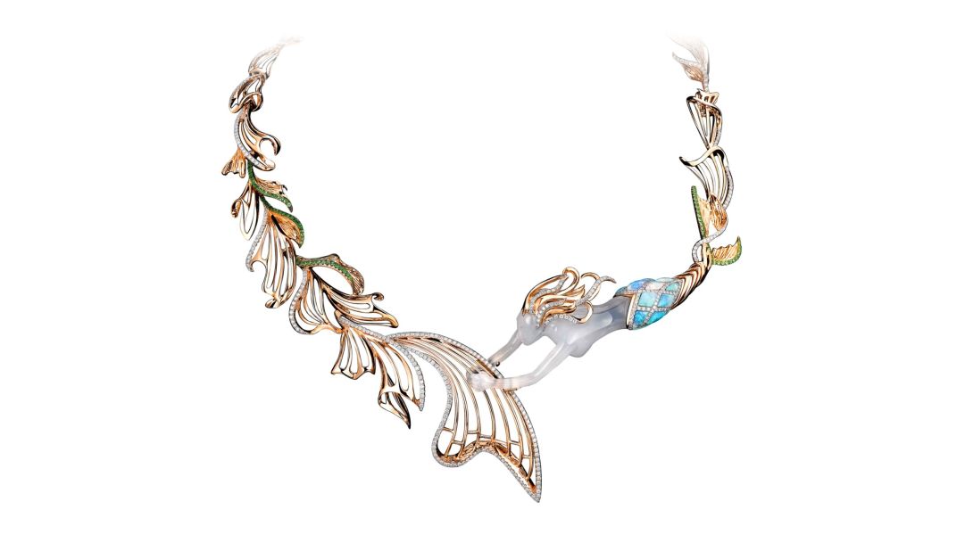 This 18K rose gold diamond necklace with opal and blue chalcedony, created by Dai Sun Jewellery's Vincent Ng, features a mermaid playing music with her tail. 
