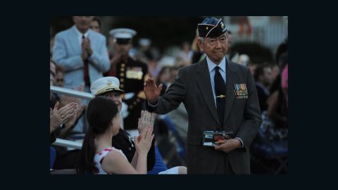 Major Kurt Chew-Een Lee, a decorated three war veteran, is honored in an evening parade in 2010.