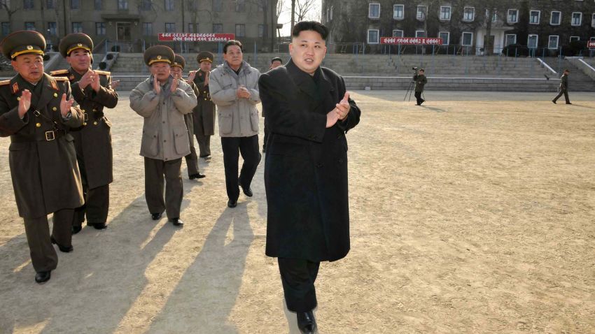 This undated picture released from Korean Central News Agency (KCNA) on January 12, 2014 shows Kim Jong-Un inspecting the command of Korean People's Army (KPA).